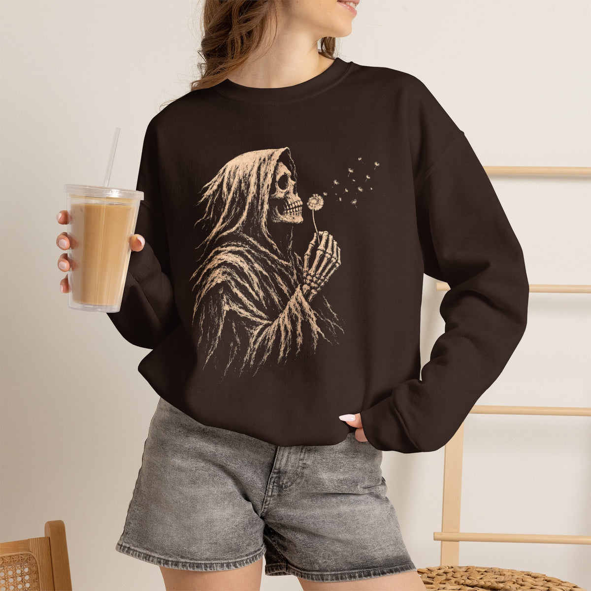 Dark Chocolate sweatshirt with skeletal grim reaper and dandelion design on front.